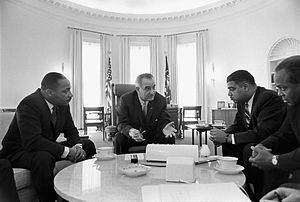 President Lyndon B. Johnson meets with Civil Rights leaders Martin Luther King, Jr., Whitney Young, and James Farmer, January 1964.